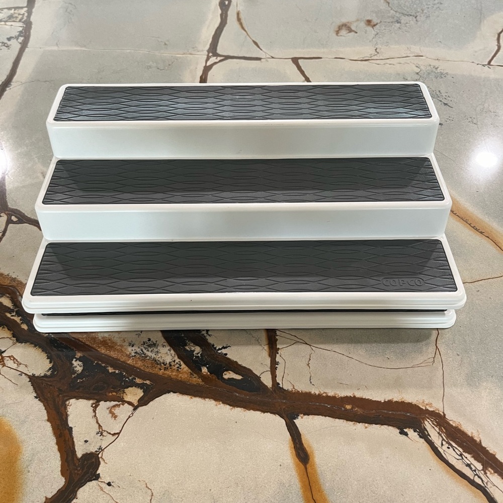 2 piece 3 Tier non skid spice shelves. Never used. Bought to many.